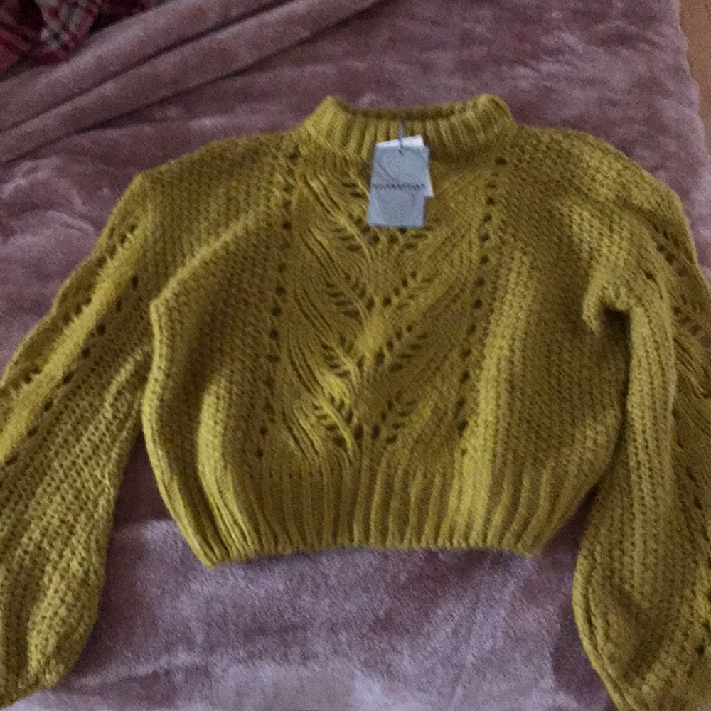 A mustard yellow sweater from SILVERFLINT!